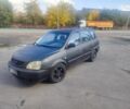 Серый Киа Каренс, объемом двигателя 2 л и пробегом 250 тыс. км за 1250 $, фото 1 на Automoto.ua