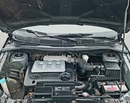 Серый Киа Каренс, объемом двигателя 1.8 л и пробегом 281 тыс. км за 3750 $, фото 9 на Automoto.ua