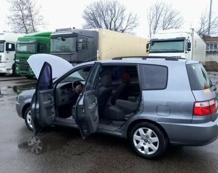 Серый Киа Каренс, объемом двигателя 1.8 л и пробегом 281 тыс. км за 3750 $, фото 1 на Automoto.ua