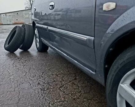 Серый Киа Каренс, объемом двигателя 1.8 л и пробегом 281 тыс. км за 3750 $, фото 25 на Automoto.ua