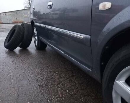 Серый Киа Каренс, объемом двигателя 1.8 л и пробегом 281 тыс. км за 3750 $, фото 28 на Automoto.ua