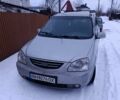 Серый Киа Каренс, объемом двигателя 2 л и пробегом 280 тыс. км за 2300 $, фото 1 на Automoto.ua