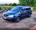Сірий Кіа Каренс, об'ємом двигуна 1.6 л та пробігом 244 тис. км за 4200 $, фото 1 на Automoto.ua