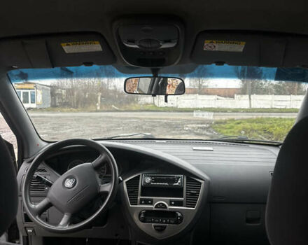 Сірий Кіа Каренс, об'ємом двигуна 1.8 л та пробігом 207 тис. км за 4990 $, фото 12 на Automoto.ua