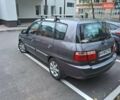 Серый Киа Каренс, объемом двигателя 2 л и пробегом 174 тыс. км за 5000 $, фото 3 на Automoto.ua