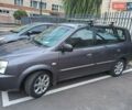 Серый Киа Каренс, объемом двигателя 2 л и пробегом 174 тыс. км за 5000 $, фото 4 на Automoto.ua