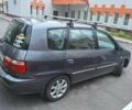 Серый Киа Каренс, объемом двигателя 2 л и пробегом 174 тыс. км за 5000 $, фото 2 на Automoto.ua