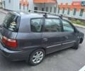 Серый Киа Каренс, объемом двигателя 2 л и пробегом 174 тыс. км за 5000 $, фото 2 на Automoto.ua