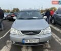 Серый Киа Каренс, объемом двигателя 1.98 л и пробегом 250 тыс. км за 4950 $, фото 1 на Automoto.ua