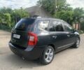 Серый Киа Каренс, объемом двигателя 2 л и пробегом 350 тыс. км за 4900 $, фото 4 на Automoto.ua