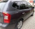 Сірий Кіа Каренс, об'ємом двигуна 2 л та пробігом 296 тис. км за 5600 $, фото 2 на Automoto.ua