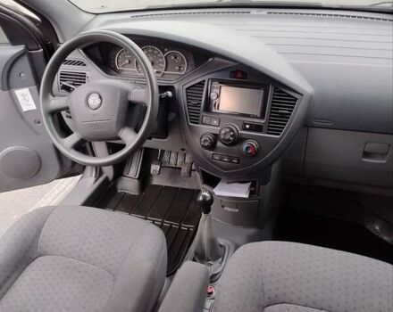 Сірий Кіа Каренс, об'ємом двигуна 1.59 л та пробігом 218 тис. км за 4800 $, фото 4 на Automoto.ua