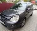 Сірий Кіа Каренс, об'ємом двигуна 2 л та пробігом 296 тис. км за 5600 $, фото 1 на Automoto.ua