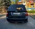 Серый Киа Каренс, объемом двигателя 1.99 л и пробегом 355 тыс. км за 4700 $, фото 16 на Automoto.ua