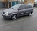 Сірий Кіа Каренс, об'ємом двигуна 1.59 л та пробігом 218 тис. км за 4800 $, фото 3 на Automoto.ua
