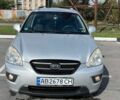 Сірий Кіа Каренс, об'ємом двигуна 2 л та пробігом 187 тис. км за 5200 $, фото 1 на Automoto.ua