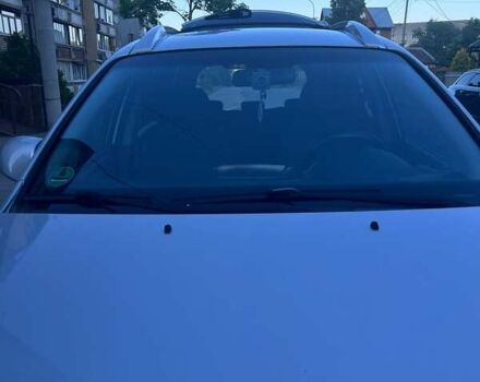 Серый Киа Каренс, объемом двигателя 2 л и пробегом 206 тыс. км за 5200 $, фото 10 на Automoto.ua