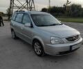 Серый Киа Каренс, объемом двигателя 2 л и пробегом 140 тыс. км за 4200 $, фото 2 на Automoto.ua
