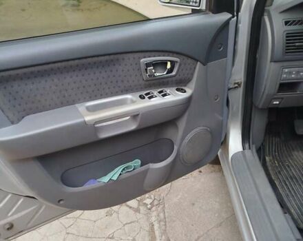 Серый Киа Каренс, объемом двигателя 1.59 л и пробегом 207 тыс. км за 4300 $, фото 7 на Automoto.ua