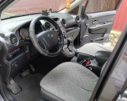 Сірий Кіа Каренс, об'ємом двигуна 2 л та пробігом 296 тис. км за 5600 $, фото 11 на Automoto.ua