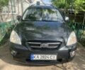 Серый Киа Каренс, объемом двигателя 2 л и пробегом 350 тыс. км за 5400 $, фото 1 на Automoto.ua