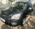 Серый Киа Каренс, объемом двигателя 2 л и пробегом 350 тыс. км за 4900 $, фото 1 на Automoto.ua