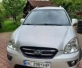 Серый Киа Каренс, объемом двигателя 2 л и пробегом 285 тыс. км за 5000 $, фото 1 на Automoto.ua