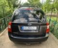 Серый Киа Каренс, объемом двигателя 2 л и пробегом 350 тыс. км за 4900 $, фото 6 на Automoto.ua