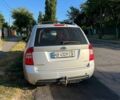 Сірий Кіа Каренс, об'ємом двигуна 1.99 л та пробігом 391 тис. км за 4900 $, фото 2 на Automoto.ua
