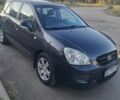 Серый Киа Каренс, объемом двигателя 2 л и пробегом 230 тыс. км за 4600 $, фото 1 на Automoto.ua