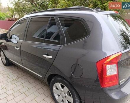 Сірий Кіа Каренс, об'ємом двигуна 2 л та пробігом 296 тис. км за 5600 $, фото 5 на Automoto.ua
