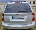 Серый Киа Каренс, объемом двигателя 1.99 л и пробегом 242 тыс. км за 5900 $, фото 5 на Automoto.ua