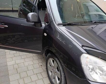 Сірий Кіа Каренс, об'ємом двигуна 2 л та пробігом 296 тис. км за 5600 $, фото 13 на Automoto.ua