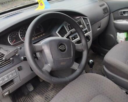 Серый Киа Каренс, объемом двигателя 1.59 л и пробегом 207 тыс. км за 4300 $, фото 8 на Automoto.ua