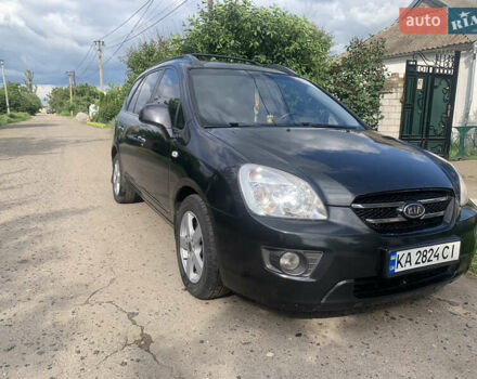 Сірий Кіа Каренс, об'ємом двигуна 2 л та пробігом 350 тис. км за 5400 $, фото 6 на Automoto.ua