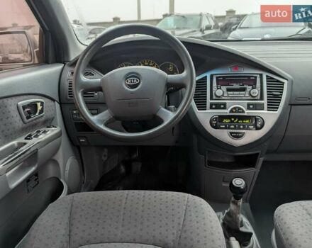 Серый Киа Каренс, объемом двигателя 2 л и пробегом 215 тыс. км за 5450 $, фото 30 на Automoto.ua