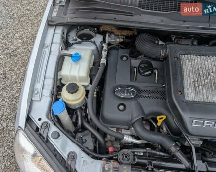 Серый Киа Каренс, объемом двигателя 2 л и пробегом 215 тыс. км за 5450 $, фото 41 на Automoto.ua