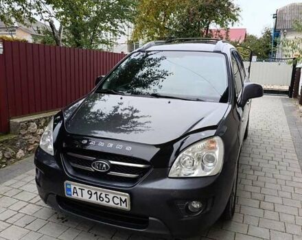 Сірий Кіа Каренс, об'ємом двигуна 2 л та пробігом 296 тис. км за 5600 $, фото 6 на Automoto.ua