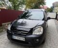 Сірий Кіа Каренс, об'ємом двигуна 2 л та пробігом 296 тис. км за 5600 $, фото 6 на Automoto.ua