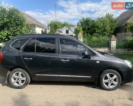 Сірий Кіа Каренс, об'ємом двигуна 2 л та пробігом 350 тис. км за 5400 $, фото 4 на Automoto.ua