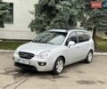 Серый Киа Каренс, объемом двигателя 2 л и пробегом 280 тыс. км за 4999 $, фото 2 на Automoto.ua