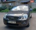 Серый Киа Каренс, объемом двигателя 2 л и пробегом 160 тыс. км за 5800 $, фото 1 на Automoto.ua