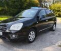 Серый Киа Каренс, объемом двигателя 2 л и пробегом 230 тыс. км за 5800 $, фото 1 на Automoto.ua