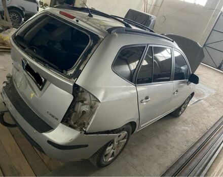 Серый Киа Каренс, объемом двигателя 2 л и пробегом 305 тыс. км за 2800 $, фото 4 на Automoto.ua