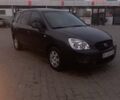 Серый Киа Каренс, объемом двигателя 2 л и пробегом 258 тыс. км за 5200 $, фото 1 на Automoto.ua