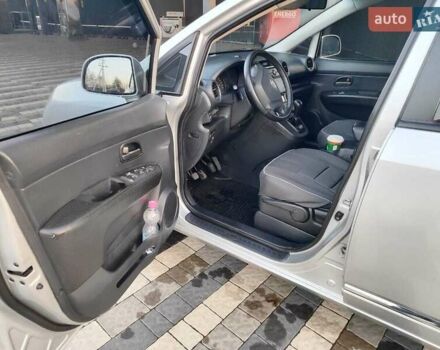 Серый Киа Каренс, объемом двигателя 2 л и пробегом 163 тыс. км за 5400 $, фото 35 на Automoto.ua