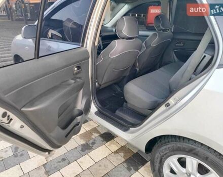 Серый Киа Каренс, объемом двигателя 2 л и пробегом 163 тыс. км за 5400 $, фото 39 на Automoto.ua