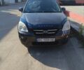 Серый Киа Каренс, объемом двигателя 2 л и пробегом 300 тыс. км за 6300 $, фото 1 на Automoto.ua