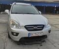 Серый Киа Каренс, объемом двигателя 2 л и пробегом 210 тыс. км за 7500 $, фото 1 на Automoto.ua