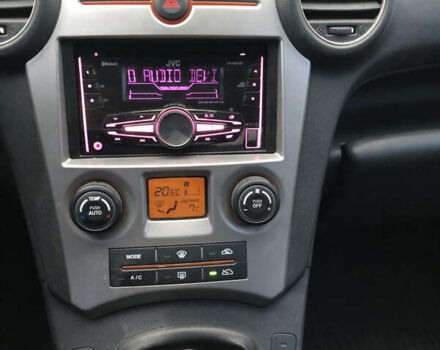 Серый Киа Каренс, объемом двигателя 1.99 л и пробегом 280 тыс. км за 4700 $, фото 11 на Automoto.ua